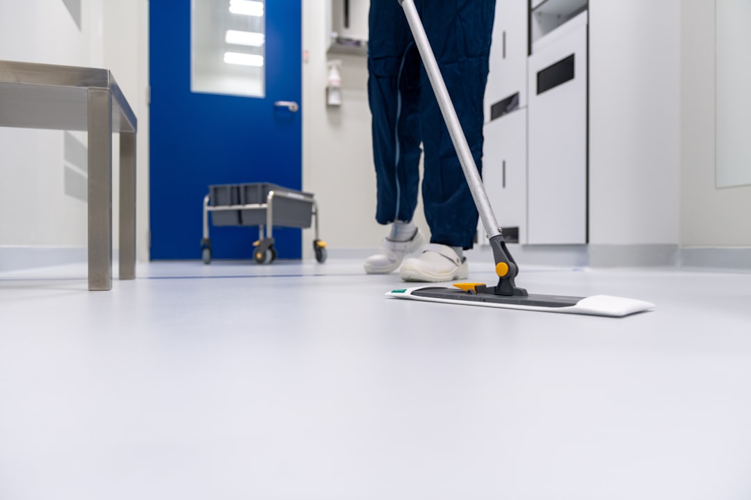 our-story Cleaner cleaning the floor in a laboratory environment